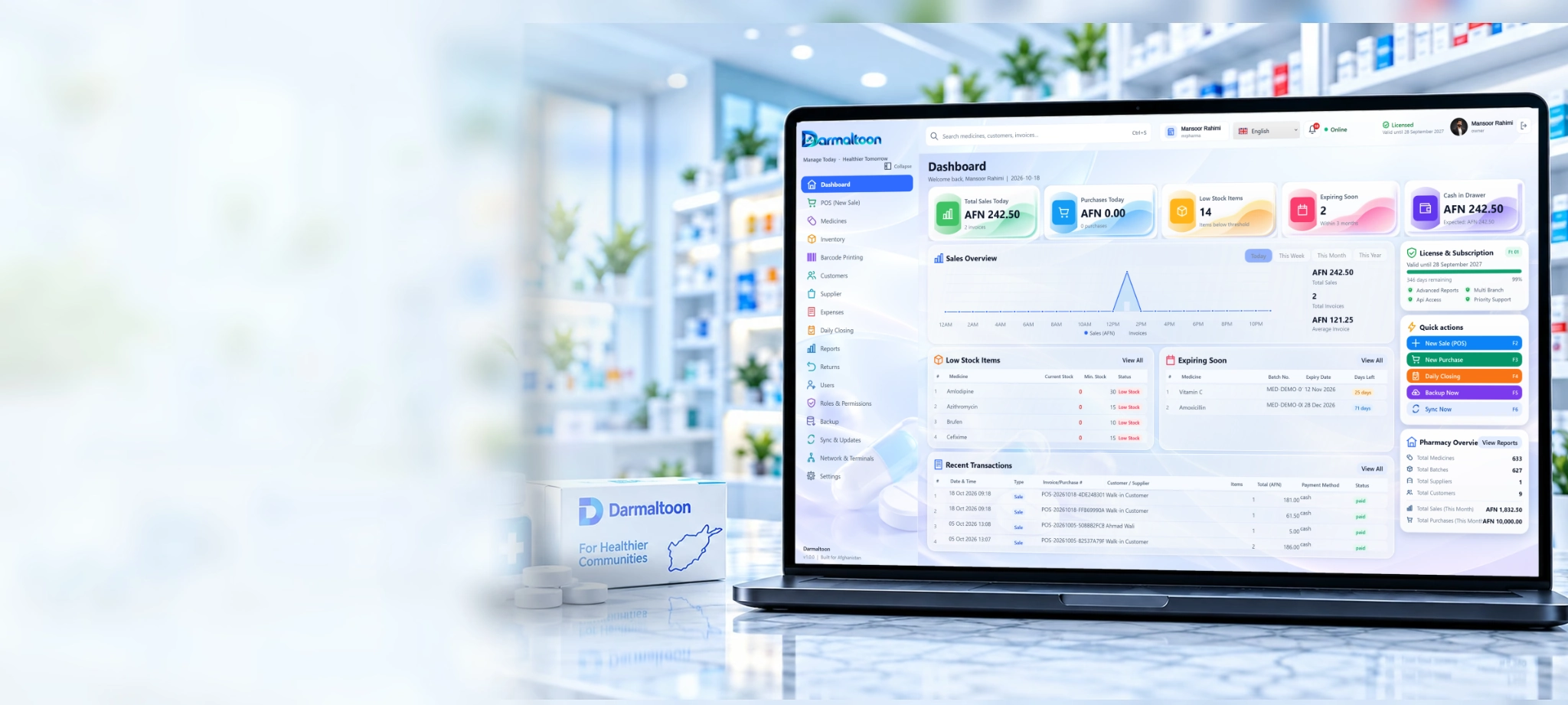 Darmaltoon pharmacy dashboard on a laptop in a pharmacy